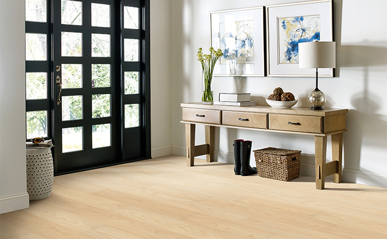 scandinavian light flooring in an entryway